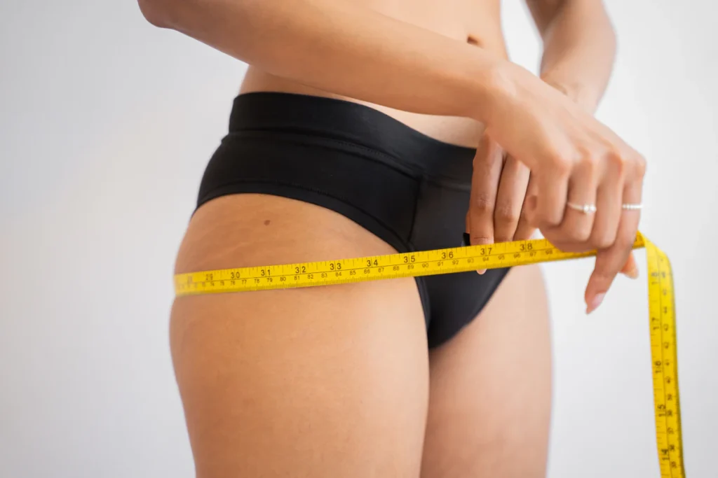 Measuring the hips before buttock augmentation
