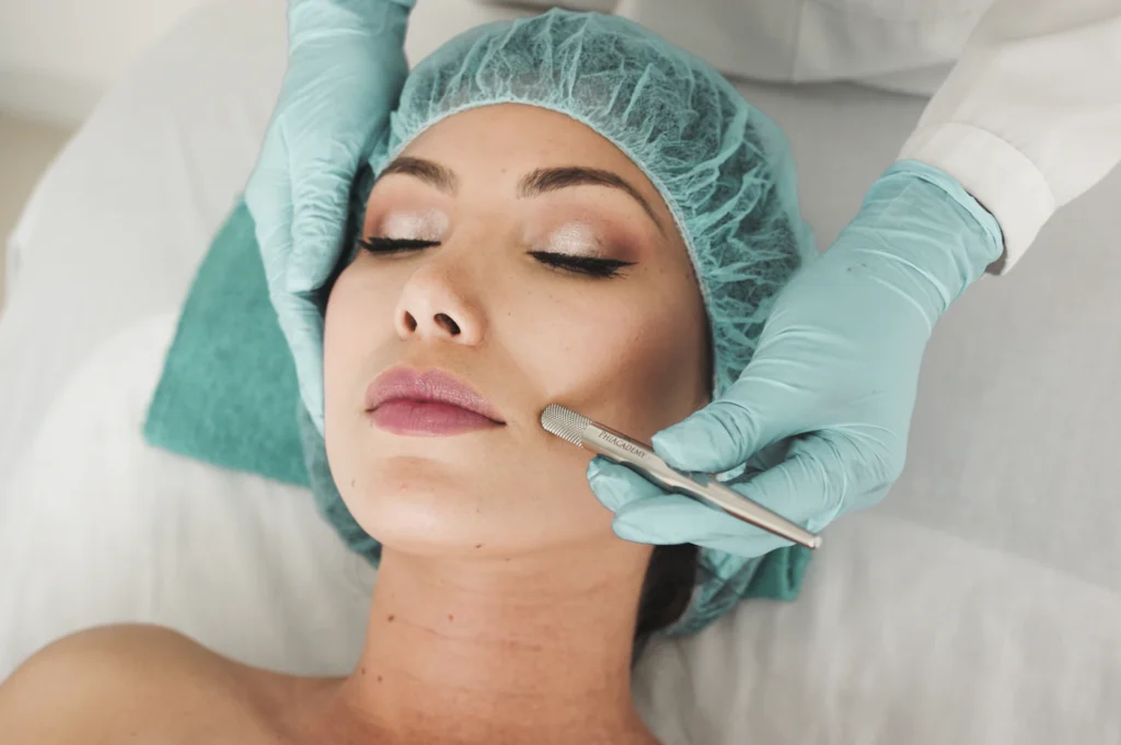 Woman receiving facial skin treatment