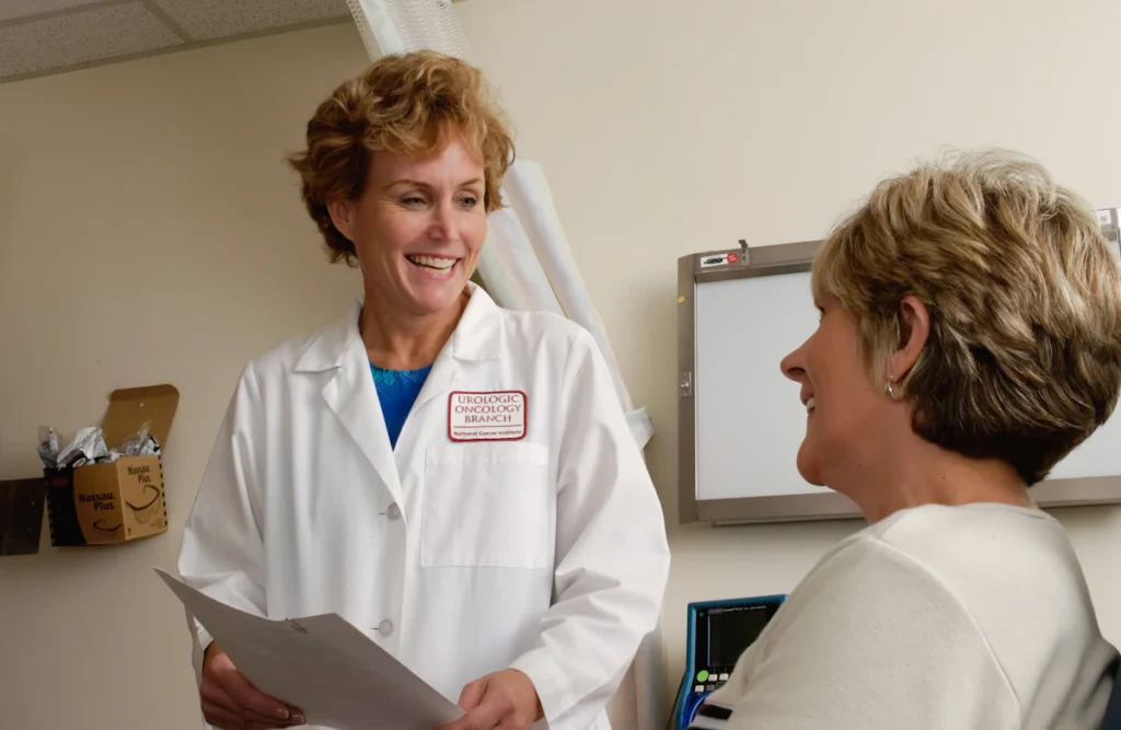 Female doctor speaking with a patient