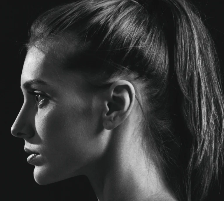 Ear lying close to the head, side profile