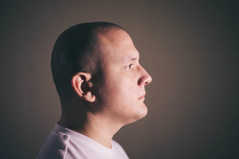 Male ear in side profile
