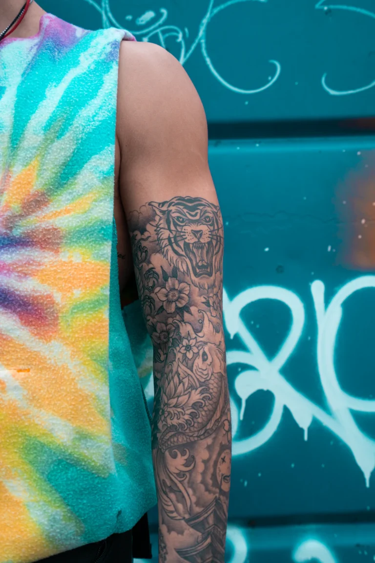 Tattooed arm with dark ink