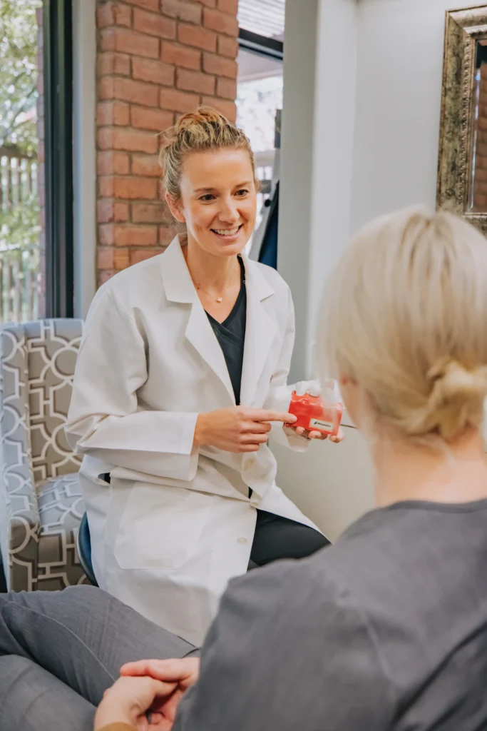 Doctor in a private consultation with a woman